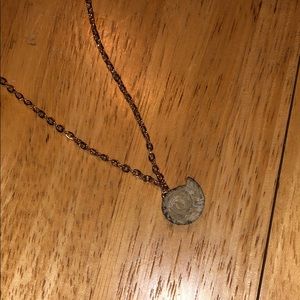Gold ammonite fossil necklace